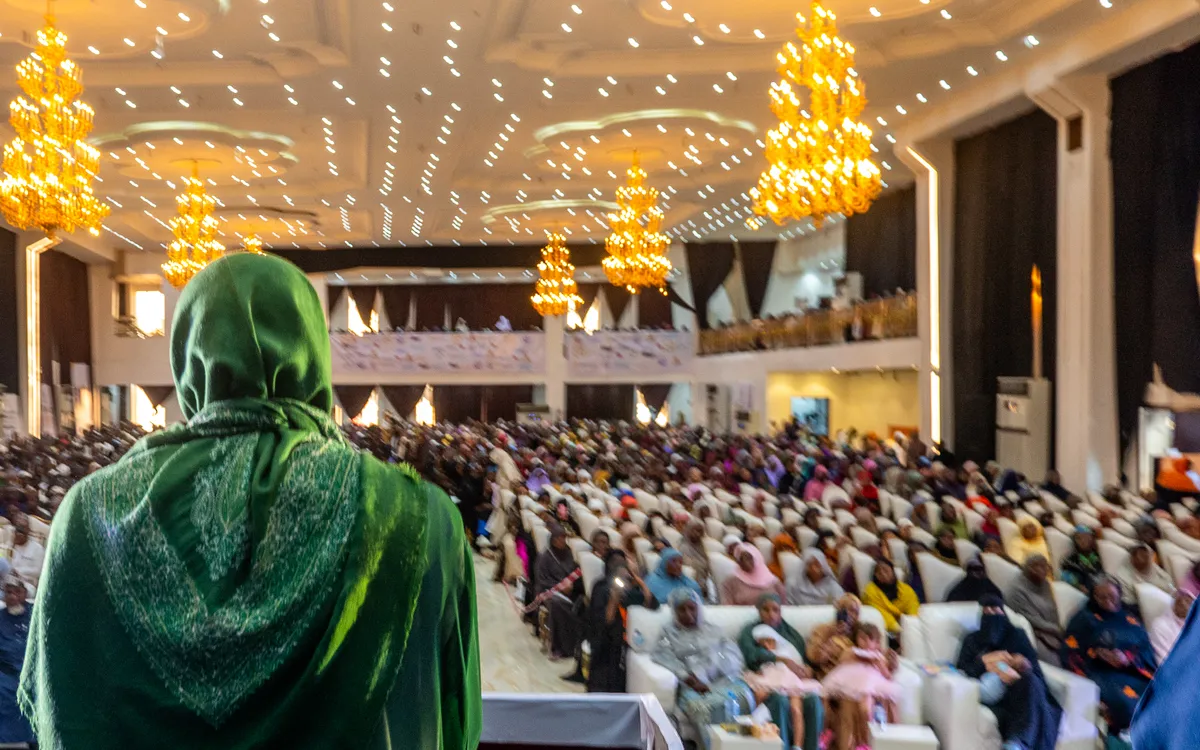 A speaker facing the convention hall
